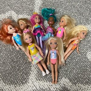Eight Barbie Chelsea size dolls